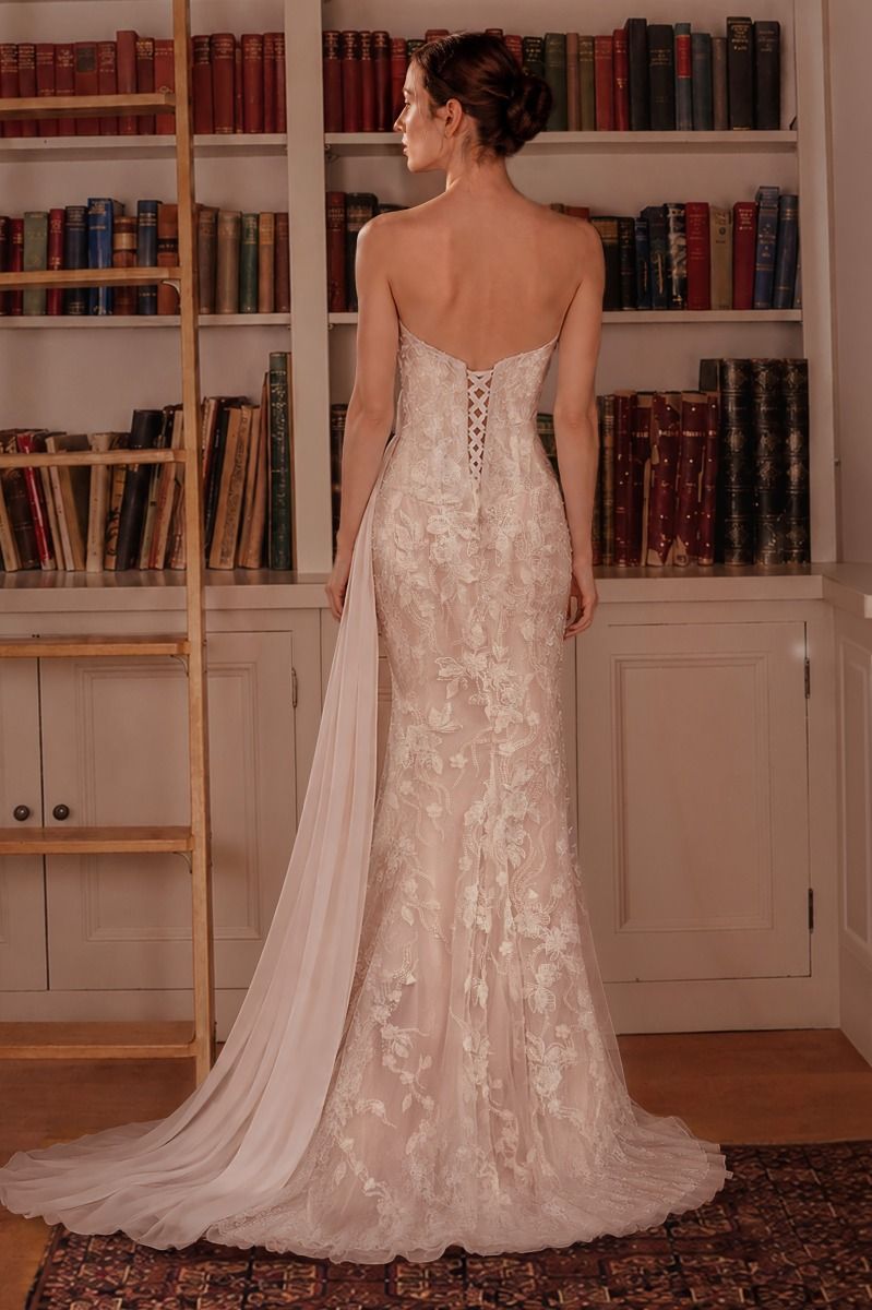 Plunging sweetheart neckline with illusion inset, floral lace appliqué
