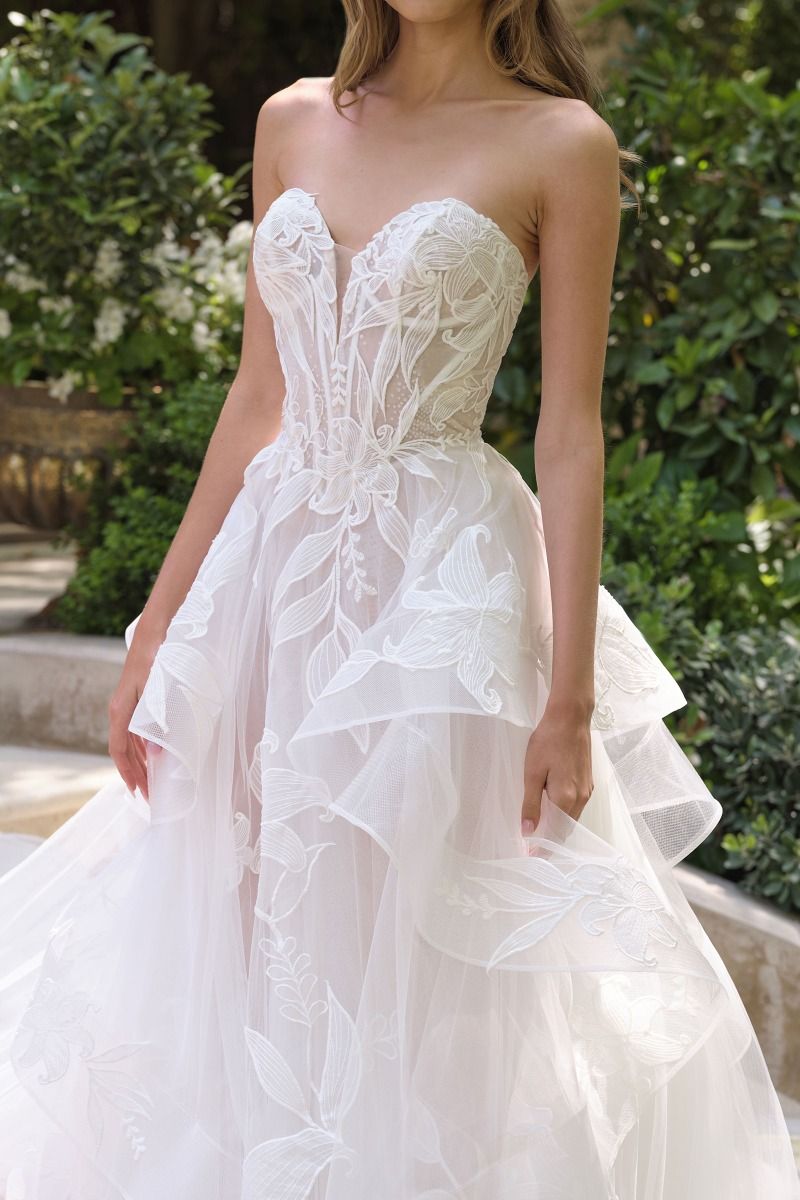 Star Lily floral design atop layered tulle