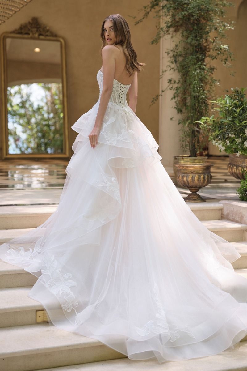 Star Lily floral design atop layered tulle