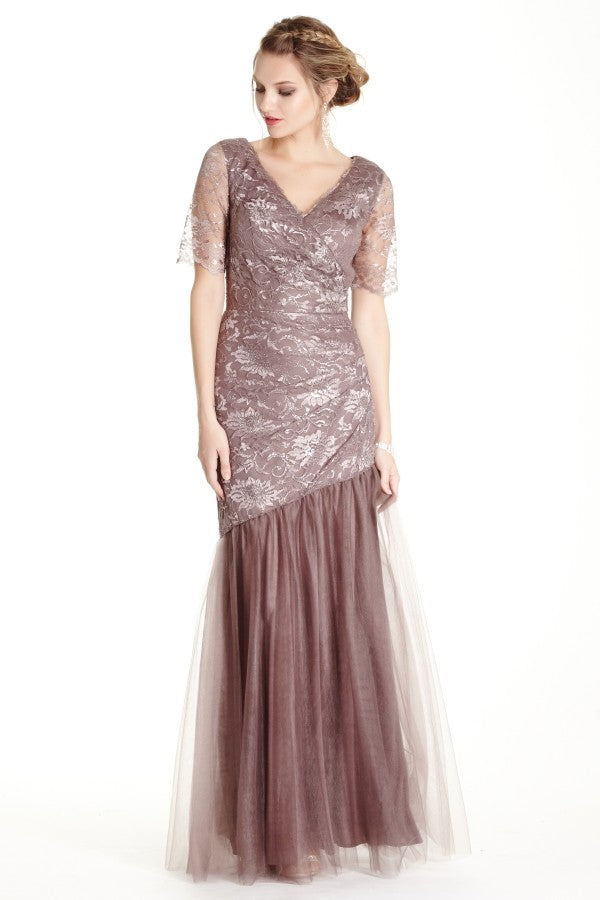 Lace mermaid dress with sheer lace half length sleeves, v-neckline, asymmetric hemline, full length skirt.